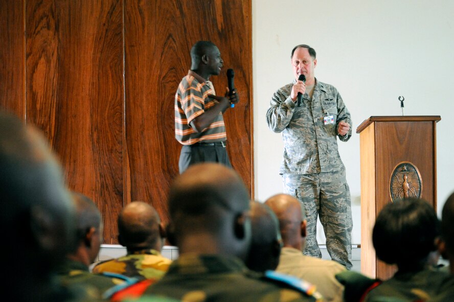 Lt. Col. Rick Vatt teaches through an interpreter to Democratic Republic of the Congo military members during MEDLITE 11, April 26, 2011, at Kinshasa, Democratic Republic of the Congo. MEDLITE 11 is a joint medical exercise focused on aeromedical evacuation, to improve the readiness of U.S. Air Force and DRC personnel. Colonel Vatt is the chief of aerospace medicine of the North Carolina Air National Guard's 145th Airlift Wing. (U.S. Air Force photo/Tech. Sgt. Todd Wivell)