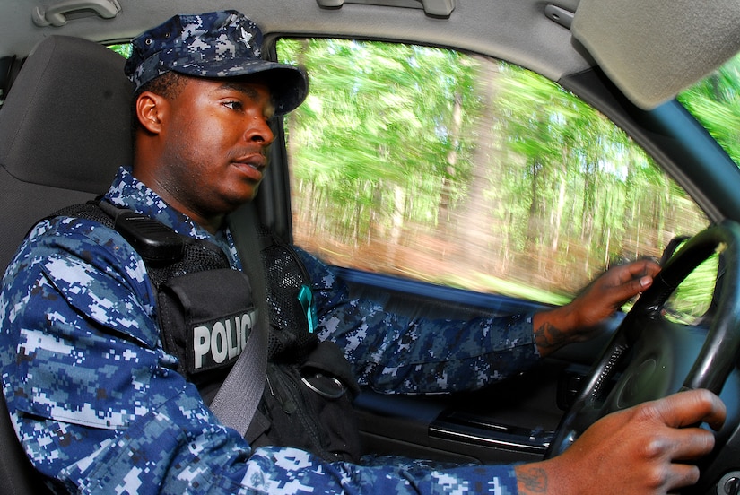 JOINT BASE CHARLESTON, S.C. (April 20, 2011) Master-at-Arms 2nd Class Sherman Whidbee, a patrolman for the 628th Security Forces Squadron, conducts a routine patrol of Marrington Plantation during his shift at Joint Base Charleston-Weapons Station, April 20.  (U.S. Navy photo/Machinist’s Mate 3rd Class Brannon Deugan)