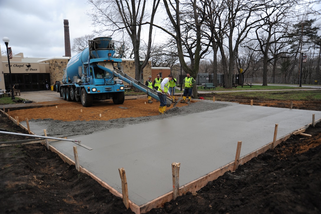 934th Airlift Wing and 96th Associate Squadron members help prepare for the summer recreation program by helping lay a concrete patio pad at the Minnesota Veterans Home April 22.
(Courtesy Photo)