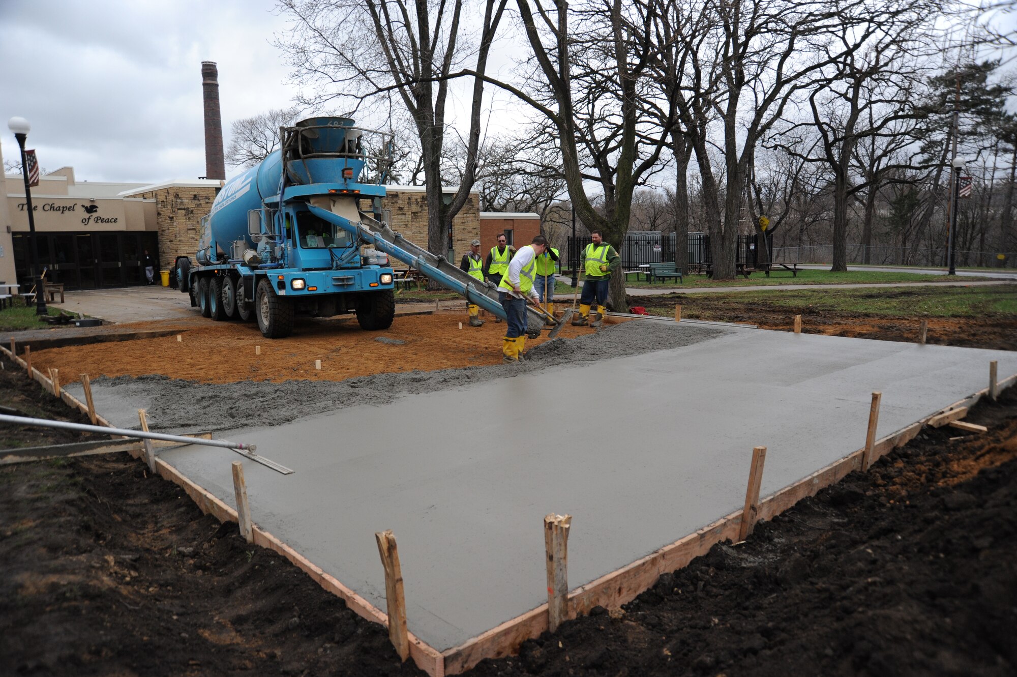 934th Airlift Wing and 96th Associate Squadron members help prepare for the summer recreation program by helping lay a concrete patio pad at the Minnesota Veterans Home April 22.
(Courtesy Photo)