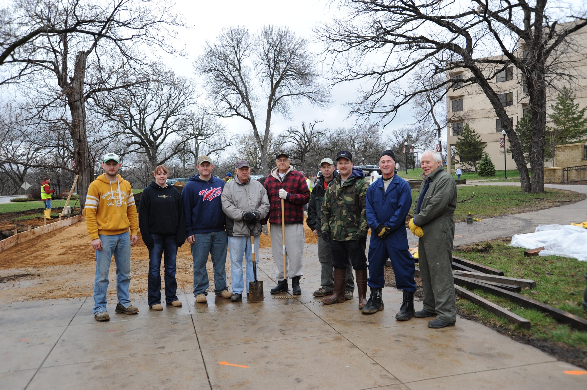 96th Associate Squadron members help prepare for the summer recreation program by helping lay a concrete patio pad at the Minnesota Veterans Home April 22.
(Courtesy Photo)