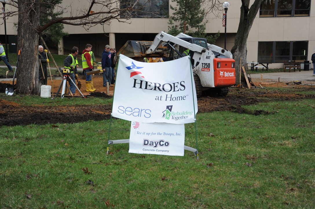 934th Airlift Wing members help prepare for the summer recreation program by helping lay a concrete patio pad at the Minnesota Veterans Home April 22.
(Courtesy Photo)