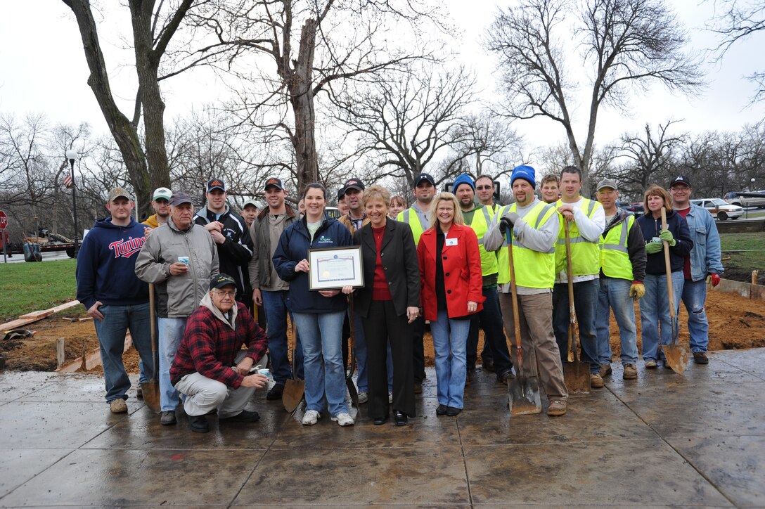 934th Airlift Wing members help prepare for the summer recreation program by helping lay a concrete patio pad at the Minnesota Veterans Home April 22.
(Courtesy Photo)