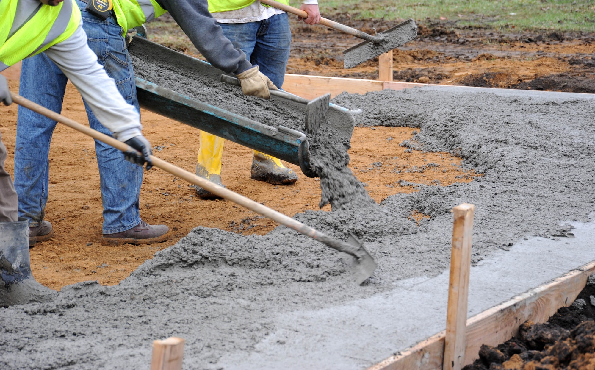934th Airlift Wing members help prepare for the summer recreation program by helping lay a concrete patio pad at the Minnesota Veterans Home April 22.
(Courtesy Photo)