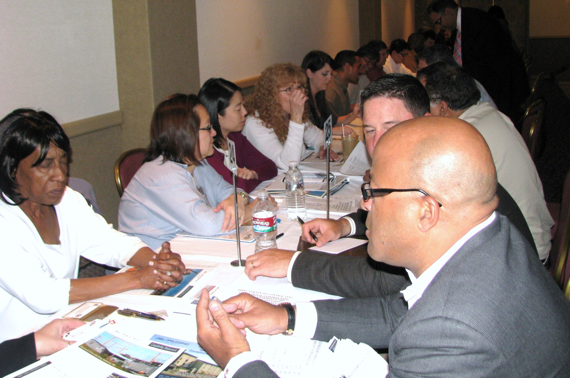 Small business representatives participate in a match-making forum April 20 during Edwards‘ Fourth Annual Small Business Seminar at Club Muroc. Businesses registered and were matched with base personnel that are compatible to the service or product that the business had to offer. (Air Force photo by Diane Betzler)