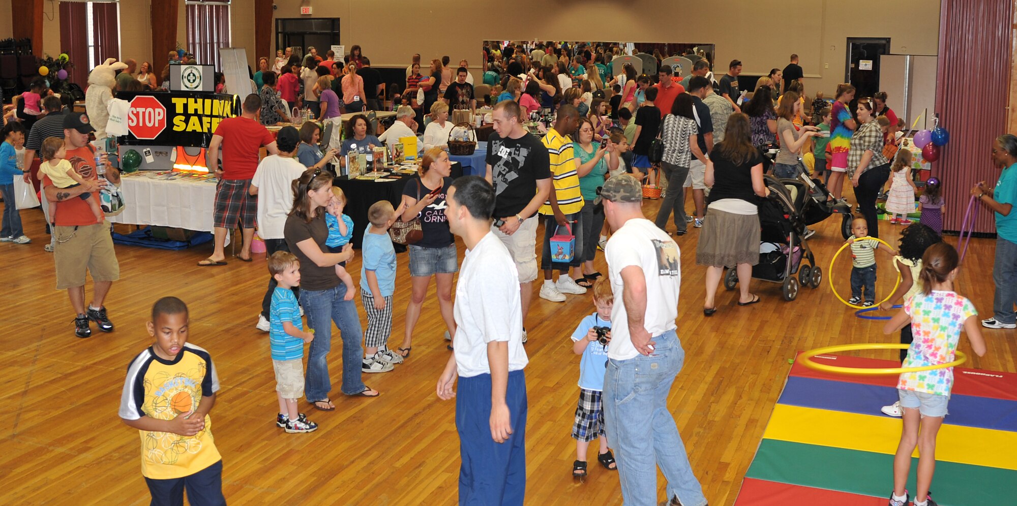 Airmen, civilians and family members take part in Family Fest games and activities inside the Thomas Community Activities Center April 23, 2011, at Little Rock Air Force Base, Ark.  The event offered activities including an egg hunt, prize giveaways and an appearance by the Easter bunny. (U.S. Air Force photo by Staff Sgt. Chris Willis)