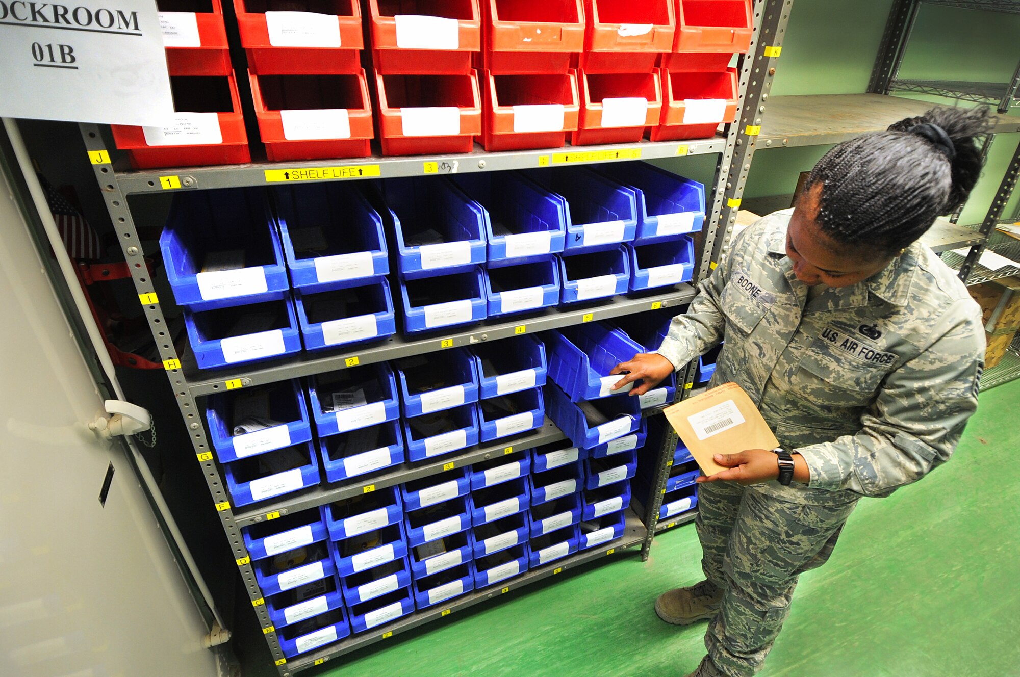 Tech. Sgt. Patrika Boone does an inventory check of the small storage supply shelf April 19. Sergeant Boone and Senior Airman Sara Blake continuously pick up shipments of parts and supplies and are building up a foundation for future rotations. Sergeant Boone is the non-commissioned officer in charge of material maintenance for the HH-60G Pave Hawk engine centralized repair facility and is deployed from Robins Air Force Base, Ga. (U.S. Air Force photo by Senior Airman Cynthia Spalding)