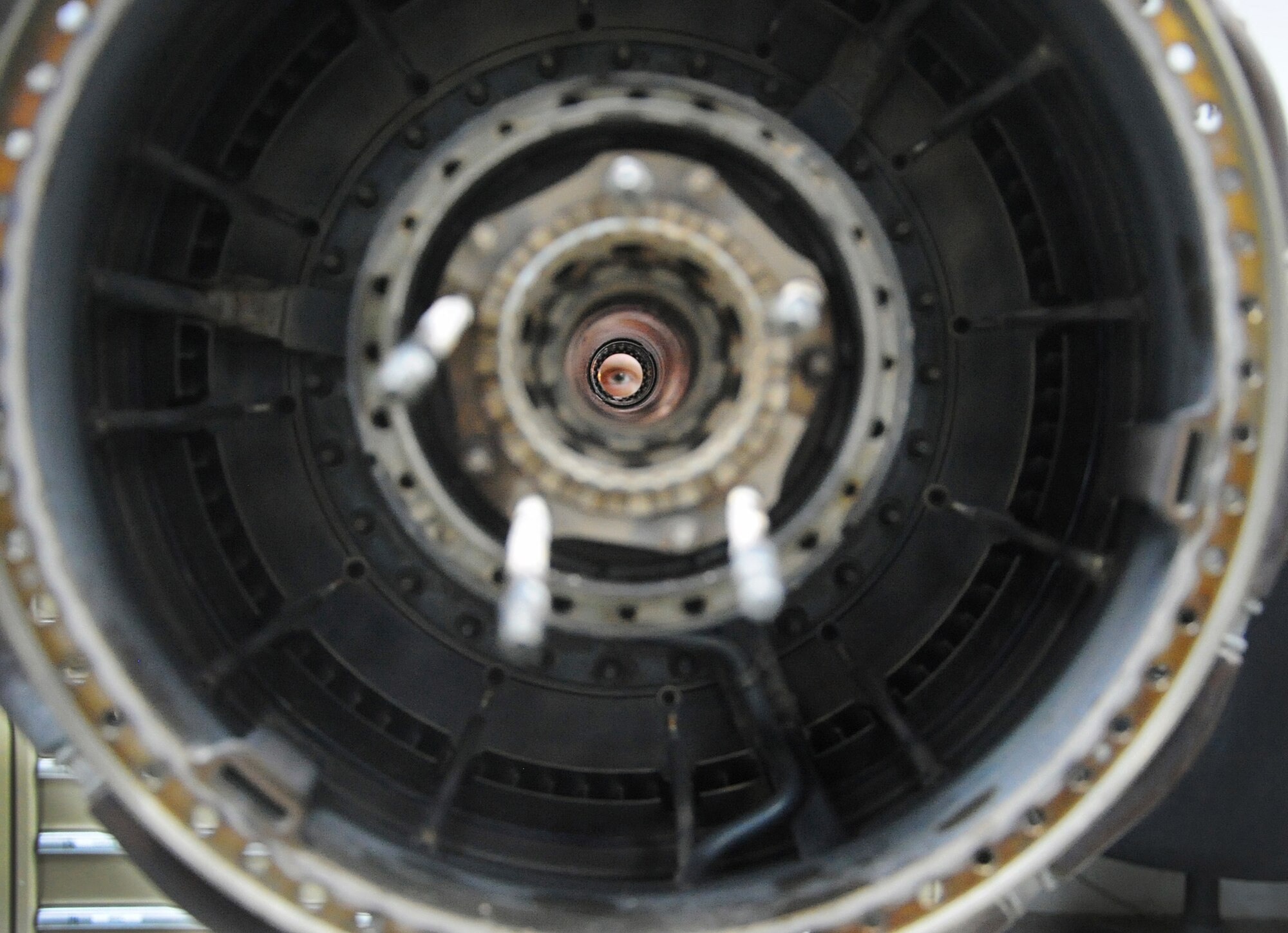 Staff Sgt. Christopher Horton inspects the a-axis seal while performing maintenance on an HH-60G Pave Hawk engine that was turned in for low power April 19. Four members of the 386th Expeditionary Maintenance Squadron Detachment 1 stood up the centralized repair facility on an Army base in Southwest Asia, which alleviates the cost and time spent in sending HH-60G Pave Hawk engines back to the United States for maintenance.  Sergeant Horton is an aerospace propulsion craftsman deployed from Moody Air Force Base, Ga. (U.S. Air Force photo by Senior Airman Cynthia Spalding)
