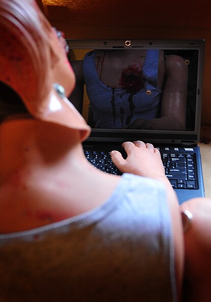 The Air Force Office of Special Investigations held an annual Crime Scene Investigation/ Active shooter exercise, here, April 27.   The scene was prepared with sheep’s blood and a moulaged dummy victim.   A husband returning from deployment, has Post Traumatic Stress Disease, kills his wife and abducts his child fleeing the dead wife scene.  The neighbor hears the shots and phones 911.   At the simulated residence, Bldg 930, Security Forces cleared the residence and OSI processed the scene gathering evidence.  The suspect killed his child and an active shooter incident took place.  This exercise helped field agents sharpen their CSI skills. (U.S. Air Force Photo by Staff Sgt. Daylena Gonzalez)