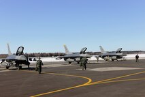 EIELSON AIR FORCE BASE, Alaska – Pilots from the 8th Fighter Wing step to fly simulated combat sorties April 15 during RED FLAG-Alaska at Eielson Air Force Base. RF-A is a Pacific Air Forces-directed field training exercise for the United States and allied forces to train under simulated air-combat situations. (U.S. Air Force photo/Staff Sgt. Thomas Skinkle)