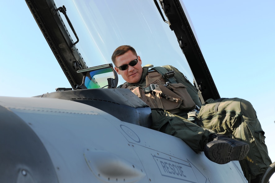 EIELSON AIR FORCE BASE, Alaska – Lt. Col. James Wilkerson, 80th Fighter Squadron commander, gets into his F-16 Fighting Falcon to fly a simulated combat sortie April 15 during RED FLAG-Alaska at Eielson Air Force Base. RF-A is a Pacific Air Forces-directed field training exercise for the United States and allied forces to train under simulated air-combat situations. (U.S. Air Force photo/Staff Sgt. Thomas Skinkle)