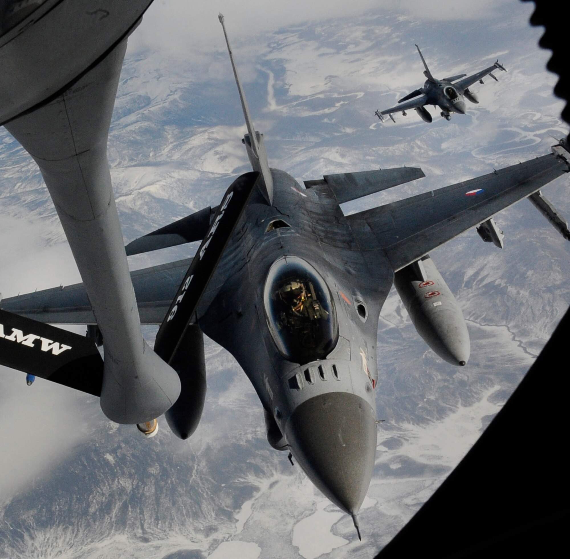An F-16 approaches a KC-135 Stratotanker for in-flight-refueling during the RED FLAG-Alaska 11-1 April 26, 2011, Eielson Air Force Base, Alaska. RF-A is a Pacific Air Forces-directed field training exercise for United States and allied forces to train under simulated air-combat situations in the Joint Pacific Alaska Range Complex with over 67,000 square miles of air space, more than 30 threat simulators, one conventional bombing range, and two tactical bombing ranges containing more than 400 different types of targets. (U.S. Air Force photo/Airman 1st Class Laura Goodgame) 