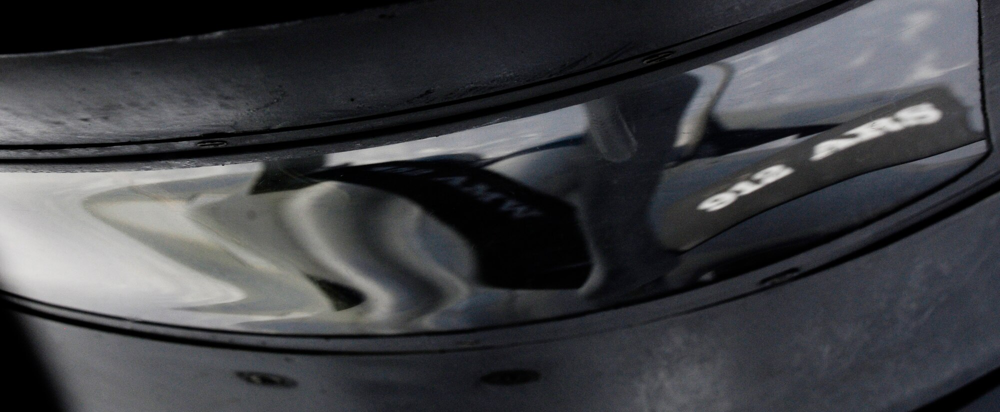 A reflection of an F-15 Eagle can be seen in the window of a KC-135 Stratotanker during an in-flight-air-refueling mission during the RED FLAG-Alaska 11-1 April 26, 2011, Eielson Air Force Base, Alaska. RF-A is a Pacific Air Forces-directed field training exercise for United States and allied forces to train under simulated air-combat situations in the Joint Pacific Alaska Range Complex with over 67,000 square miles of air space, more than 30 threat simulators, one conventional bombing range, and two tactical bombing ranges containing more than 400 different types of targets. (U.S. Air Force photo/Airman 1st Class Laura Goodgame) 