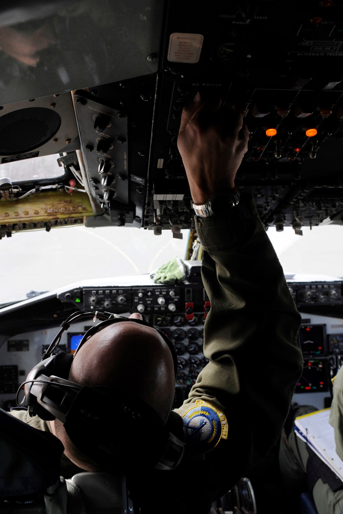 Capt. Rob Akman adjusts the cabin controls as a preflight inspection during RED FLAG-Alaska 11-1 April 26, 2011, Eielson Air Force Base, Alaska. RF-A is a Pacific Air Forces-directed field training exercise for United States and allied forces to train under simulated air-combat situations. Pilots must accomplish prior to aircraft departure. Captain Akman is a pilot assigned to the 126th Air Refueling Wing, 906th Air Refueling Squadron, Scott Air Force Base, Ill. (U.S. Air Force photo/Airman 1st Class Laura Goodgame) 