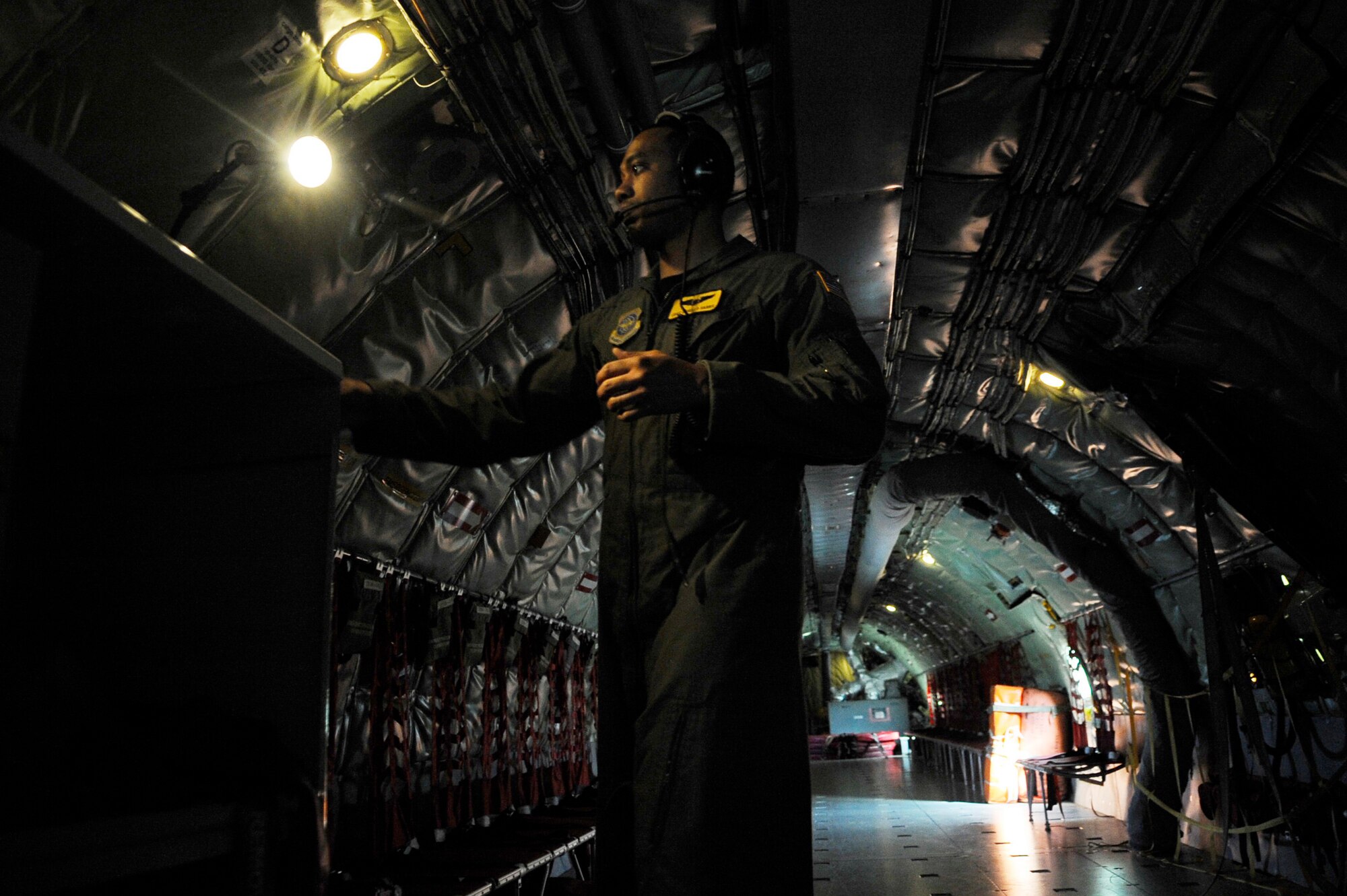 Staff Sgt. Othello Harris executes pre flight maintenance on a KC-135 Stratotanker during RED FLAG-Alaska 11-1 April, 26, 2011, Eielson Air Force Base, Alaska. RF-A is a field training exercise conducted inside the Joint Pacific Alaska Range Complex with over 67,000 square miles of air space, more than 30 threat simulators, one conventional bombing range, and two tactical bombing ranges containing more than 400 different types of targets. Sergeant Harris is a boom operator assigned to the126th Air Refueling Wing, 906th Air Refueling Squadron, Scott Air Force Base, Ill. (U.S. Air Force photo/Airman 1st Class Laura Goodgame) 