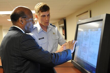 Dr. Clifford Stanley, Under Secretary of Defense for Personnel and Readiness, receives a demonstration on the Electronic Board Operating Support System, given by Maj. Ryan Richardson, Air Force Personnel Center, April 27 at Randolph Air Force Base, Texas. (U.S. Air Force photo/Melissa Peterson)