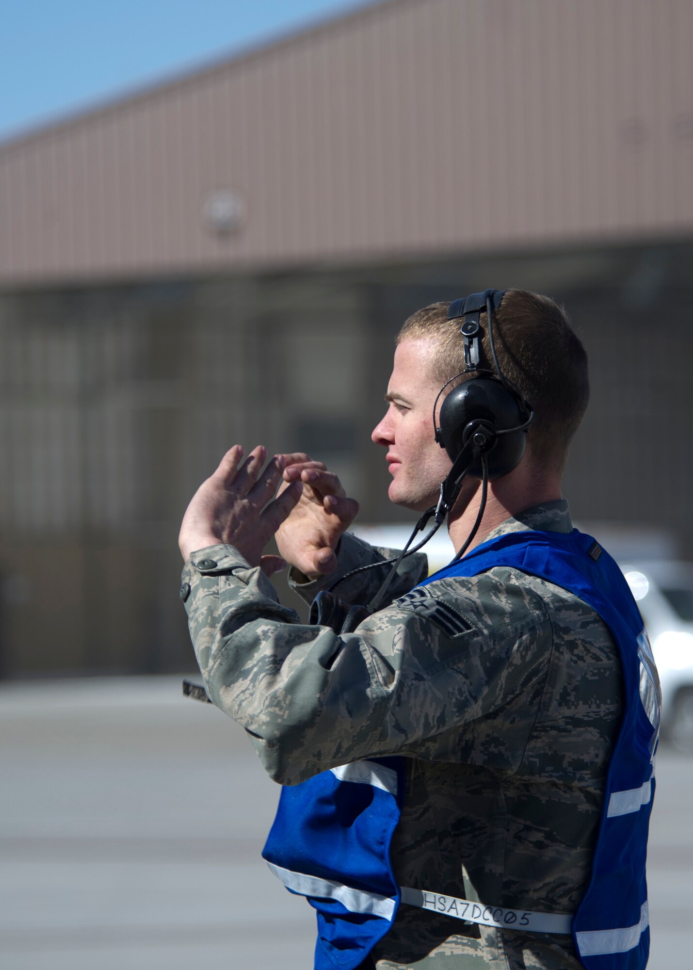 HOLLOMAN AIR FORCE BASE, N.M. -- Senior Airman Robert Pray, 49th Aircraft Maintenance Squadron, marshals an F-22 Raptor in place for takeoff, April 27, 2010, during the 49th Wing’s Operational Readiness Inspection. The purpose of an ORI is to show the Air Combat Command Inspector General team that Team Holloman can quickly transition from peacetime readiness to a wartime posture. (U.S. Air Force photo by Senior Airman Veronica Stamps/Released)
