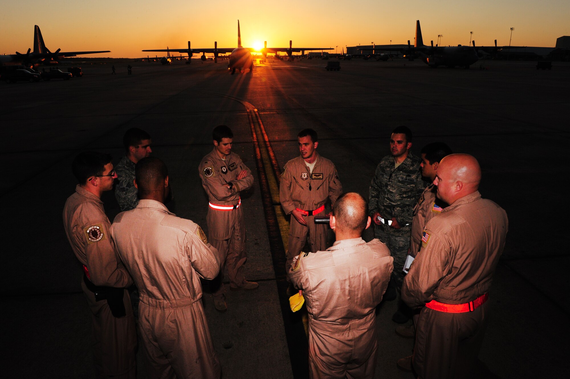 Airmen from the 50th Airlift Squadron “Red Devils” perform a preflight briefing for their deployment to Southwest Asia on April 28, 2011 at Little Rock Air Force Base, Ark. This group will be the first of nearly 20 C-130 aircraft and 1,000 Airmen slated to leave for deployments in the next week. (U.S. Air Force photo by Senior Airman Jim Araos)
