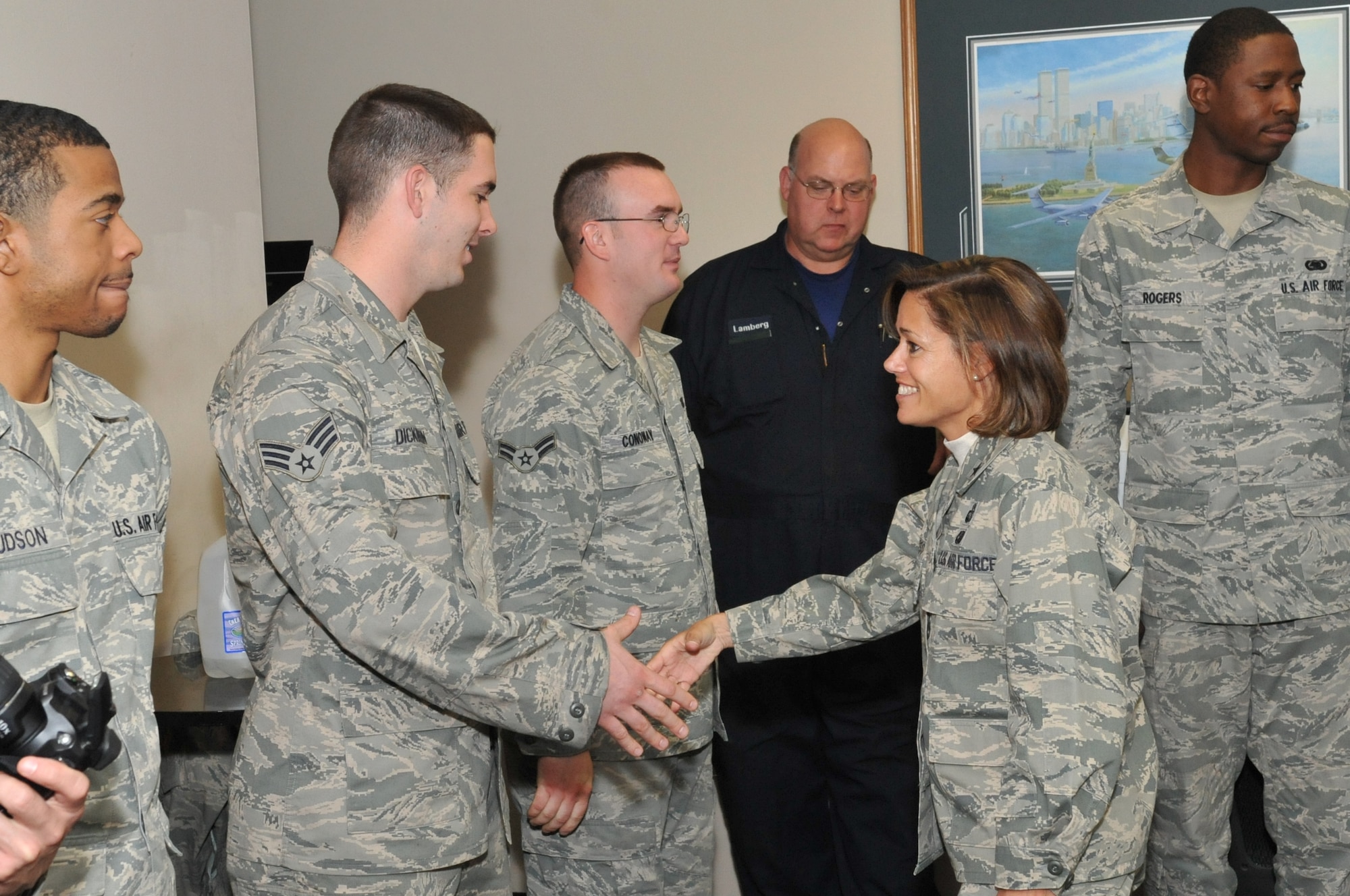 Brig. Gen. Gina Grosso, Joint Base McGuire-Dix-Lakehurst commander, congratulates Airmen from the 87th Logistics Readiness Squadron for being recognized as the best fuels management flight for fiscal year 2010. (U.S. Air Force photo by Wayne Russell/Released) 