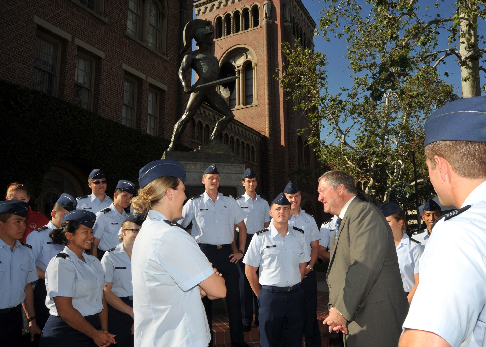 Secretary of the Air Force Michael Donley speaks with cadets from the University of Southern California’s Air Force ROTC Det. 60 in front of the Tommy Trojan Statute April 25, 2011, during a visit to the USC campus. (U.S. Air Force photo/Lou Hernandez)