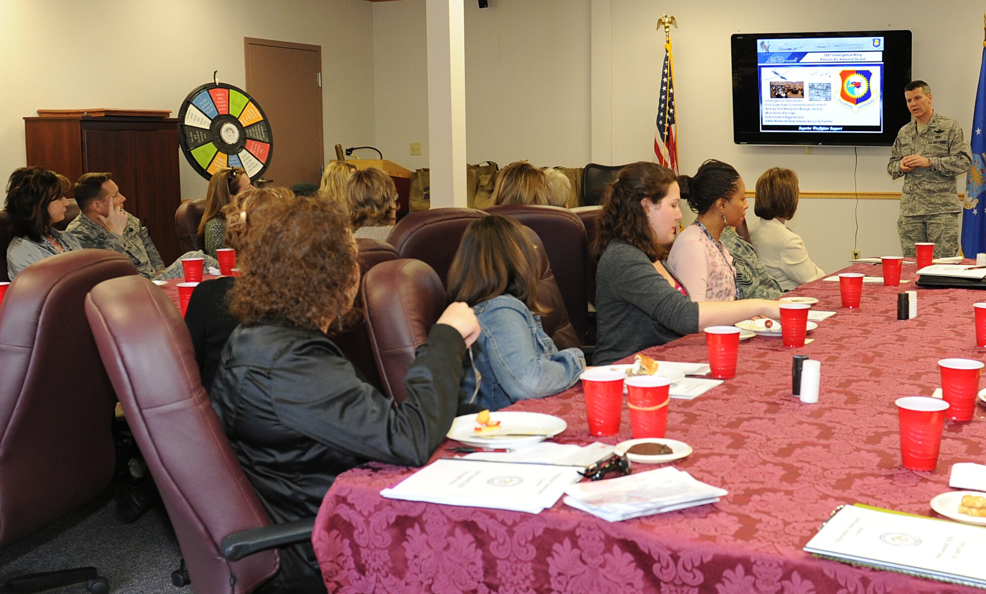 Col. Jamie Crowhurst, 22nd Air Refueling Wing commander, speaks with Wichita-area educators during a deployment education briefing April 26, 2011, McConnell Air Force Base, Kan. The educators received handouts, a tour of a KC-135 Stratotanker and a walk-through of a deployment line. The experience gave the educators an understanding of the lives of Team McConnell children, and the issues these children face in terms of transitions and deployments. Currently, military child education is a focal point Air Force-wide and government-wide. (U.S. Air Force Photo/Airman 1st Class Katrina M. Brisbin) 