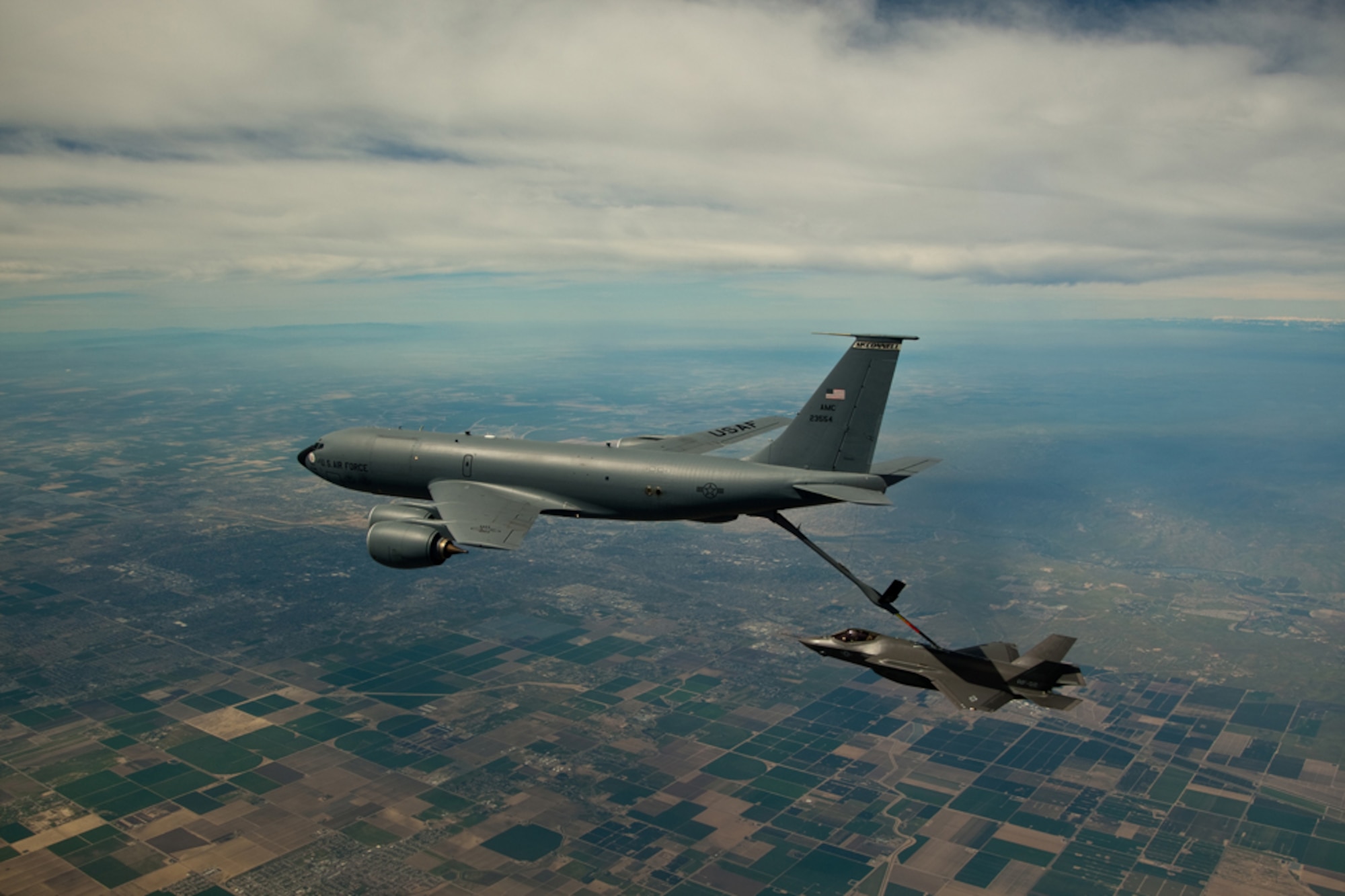 A KC-135R Stratotanker from the 916th Air Refueling Wing refuels the Air Force's newest fighter, the F-35.Lightning II. This Air Force Reserve wing was the first in Air Mobility Command to refuel the new joint strike fighter. (USAF photo by Darin Russell)