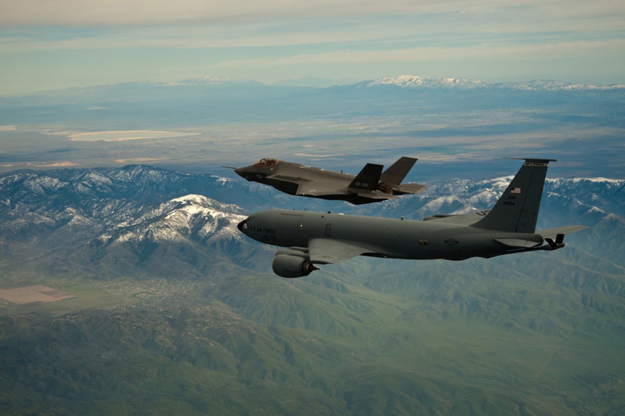 A KC-135R Stratotanker from the 916th Air Refueling Wing flies along with the Air Force's newest fighter, the F-35.Lightning II. This Air Force Reserve wing was the first in Air Mobility Command to refuel the new joint strike fighter. (USAF photo by Darin Russell)