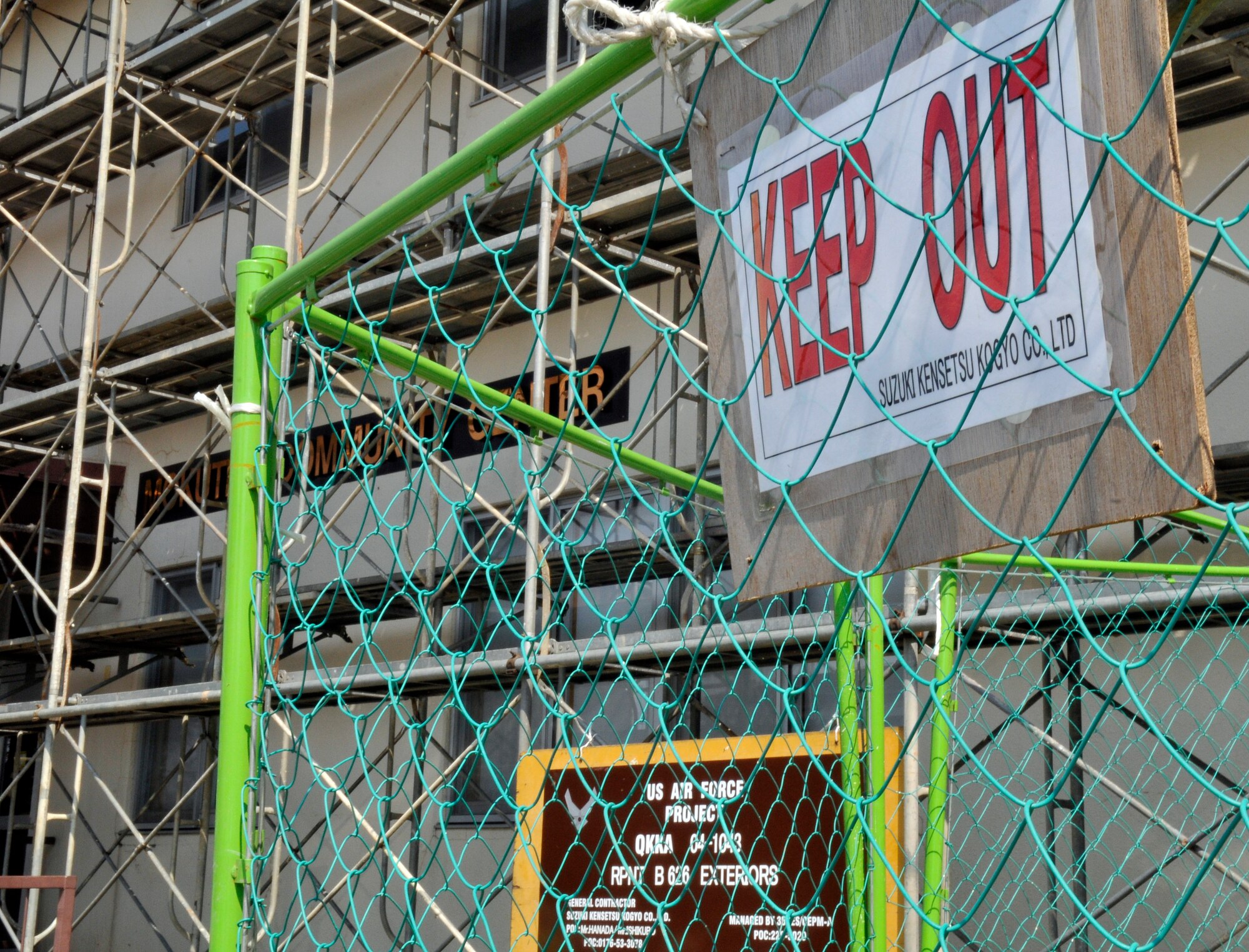 MISAWA AIR BASE, Japan – A sign warns of potential hazards as the Mokuteki Community Center receives a facelift April 26. The Mokuteki is having exterior work done to include new paint and roof. The estimated completion date is August. (U.S. Air Force photo/Tech. Sgt. Phillip Butterfield)

