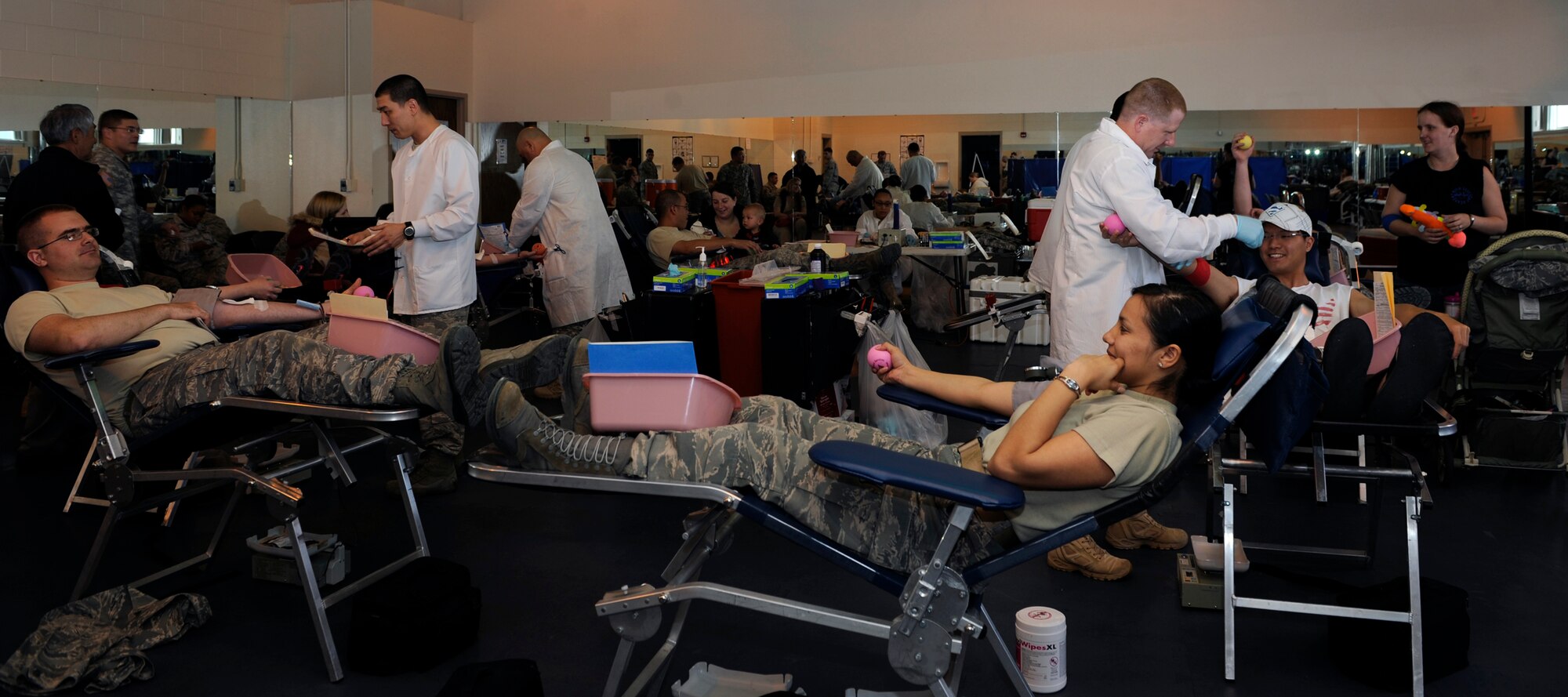 MOUNTAIN HOME AIR FORCE BASE, Idaho – Gunfighters support the Armed Services Blood Program blood drive April 26 at the base fitness center. By the end of the drive, 118 units of blood had been collected by 158 volunteers. (U.S Air Force photo by Senior Airman Angelina Drake)