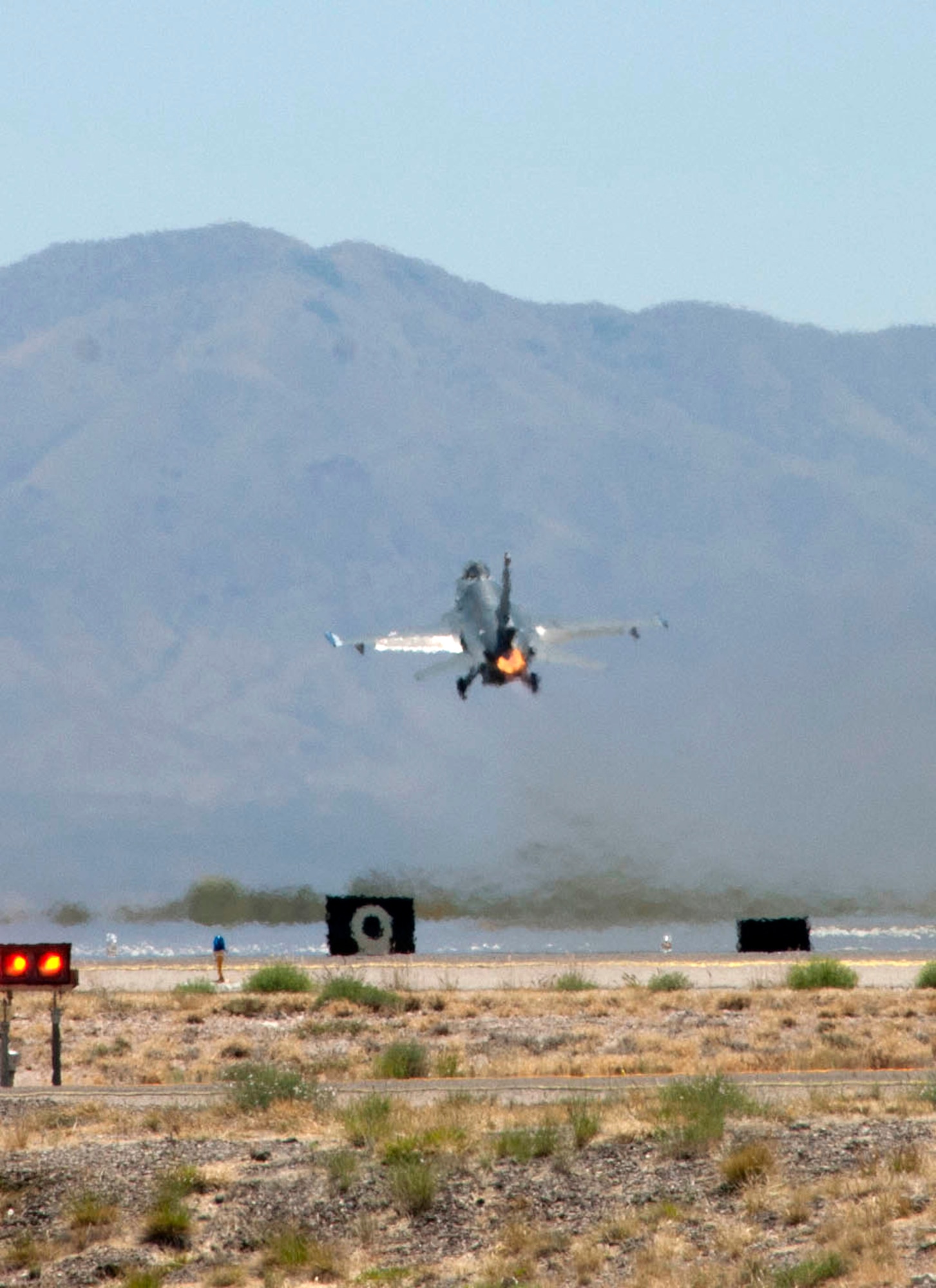 Lt. Daniel, a student pilot from the Royal Netherlands Air Force, takes off in an F-16 Fighting Falcon at Tucson International Airport, April 28. The 162nd Fighter Wing here trains Dutch fighter pilots in Dutch-owned F-16 Mid-Life Update aircraft - essentially early-model F-16A/B's that have undergone cockpit and avionics upgrades that make them as capable as the newer C/D-models. Lt. Daniel’s last name is omitted for security purposes. (U.S. Air Force photo/Master Sgt. Dave Neve)