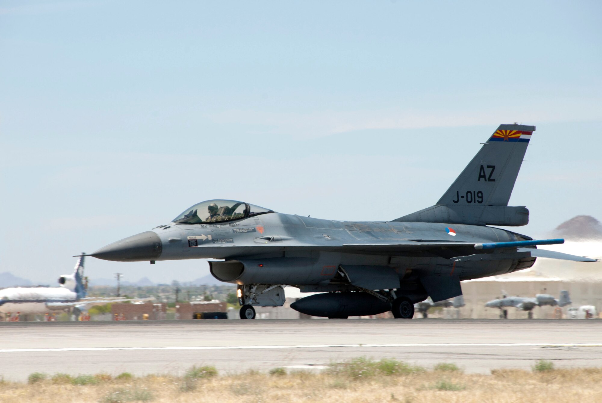 Lt. Daniel, a student pilot from the Royal Netherlands Air Force, takes off in an F-16 Fighting Falcon at Tucson International Airport, April 28. The 162nd Fighter Wing here trains Dutch fighter pilots in Dutch-owned F-16 Mid-Life Update aircraft - essentially early-model F-16A/B's that have undergone cockpit and avionics upgrades that make them as capable as the newer C/D-models. Lt. Daniel’s last name is omitted for security purposes. (U.S. Air Force photo/Master Sgt. Dave Neve)