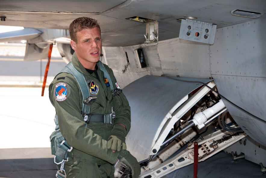 Lt. Daniel, a student F-16 pilot from the Royal Netherlands Air Force, performs a pre-flight check on the 162nd Fighter Wing flightline, April 28. He’s one of the first Dutch students to train in Tucson since the RNLAF program was re-introduced at the wing in January. The Dutch previously trained with the wing from 1989 through 2007. Lt. Daniel’s last name is omitted for security purposes. (U.S. Air Force photo/Master Sgt. Dave Neve)