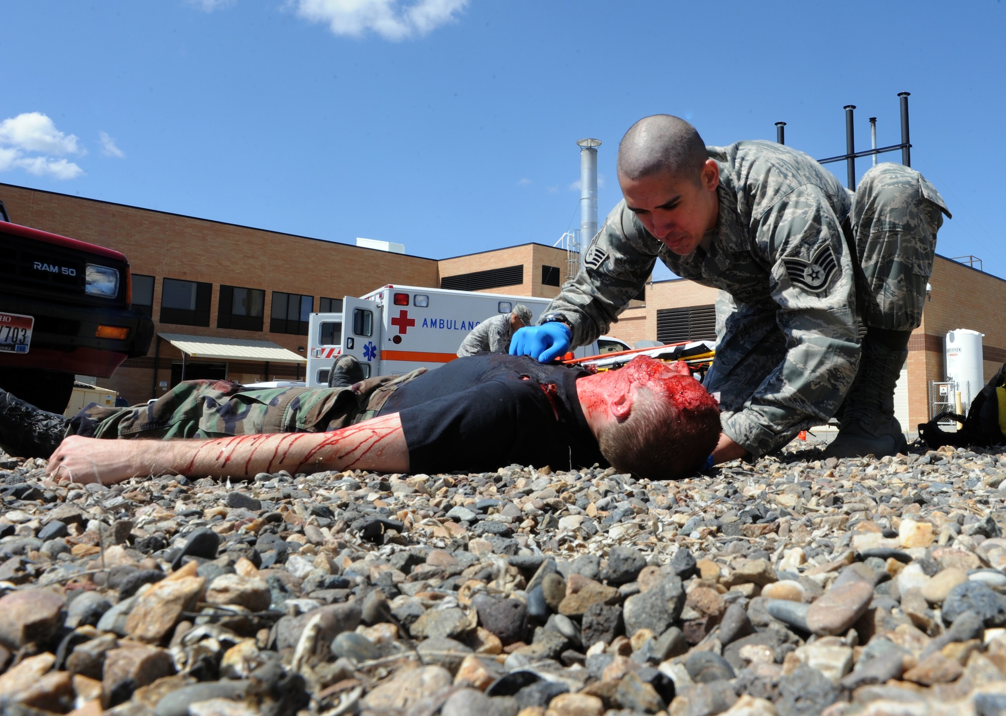 MOUNTAIN HOME AIR FORCE BASE, Idaho – Staff Sgt. Kalani Kaauamo, 366th Medical Group, performs triage after a simulated car accident at the base hospital during the 366th Medical Group honorary commander tour April 22. Airmen from the 366th MDG volunteered their time to demonstrate the hospital’s capabilities to the honorary commanders program, which provides a glimpse of military life to members of neighboring communities -- many of whom have no connection to the Air Force. (U.S. Air Force photo by Senior Airman Debbie Lockhart)