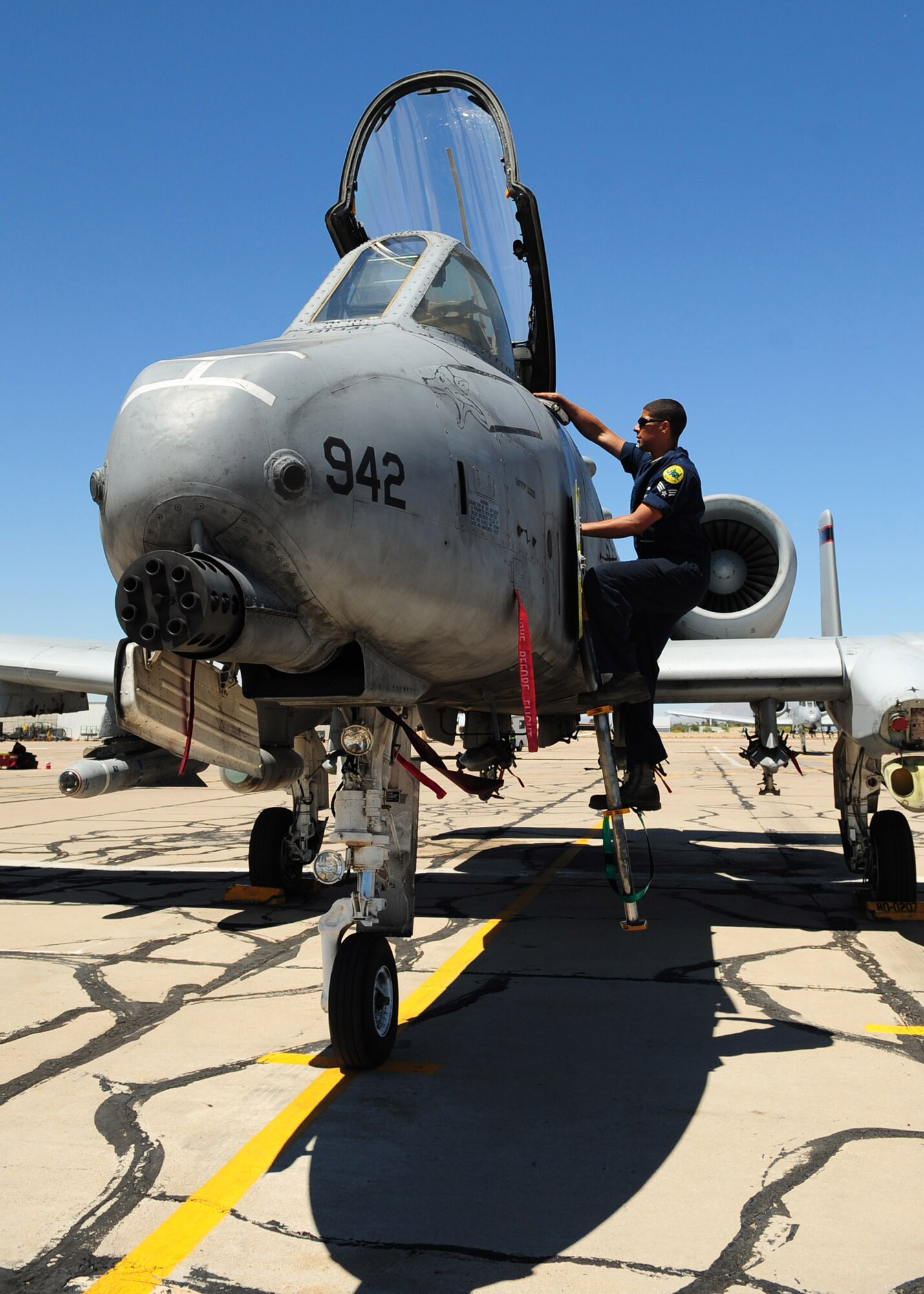 TUCSON, Ariz. - Senior Airman Maurice Wilson, a crew chief from the 355th Aircraft Maintenance Squadron, prepares his aircraft for departure at the Tucson International Airport here April 27. D-M closed its runway in March for routine maintenance which pushed many of D-M's flying missions, to include A-10, C-130 and air sovereignty alert F-16 operations, to operate out of Tucson International Airport and other locations. (U.S. Air Force photo/Airman 1st Class Jerilyn Quintanilla)