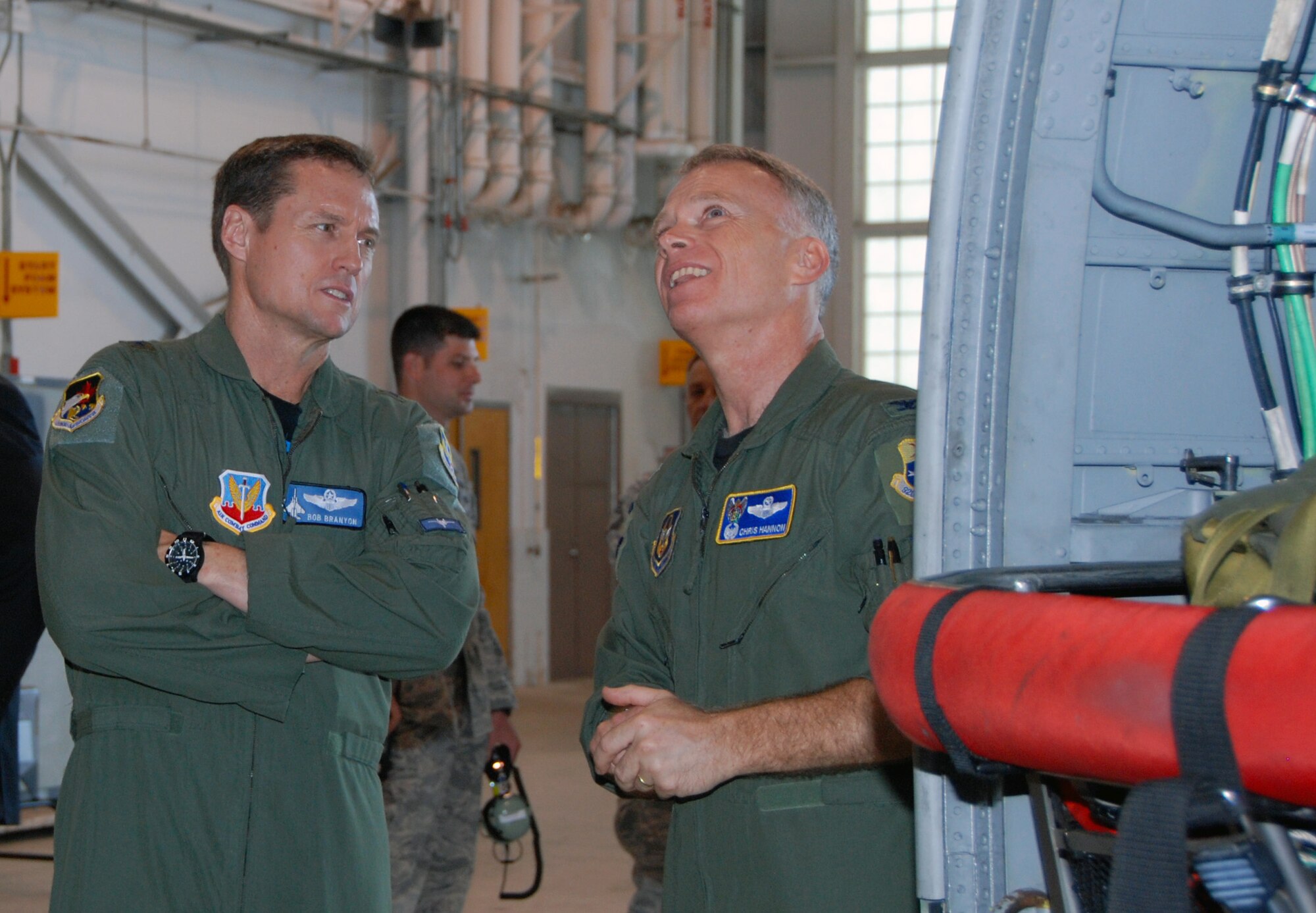 Brig. Gen. Robert Branyon, 1st Air Force vice commander, listens as Col. Chris Hannon, 920th Rescue Wing director of operations, talks about the capabilities of the HH-60G helicopter  during a tour of search and rescue assets at Patrick AFB, Fla., April 28. (U.S. Air Force photo by: Capt. Jared Scott)