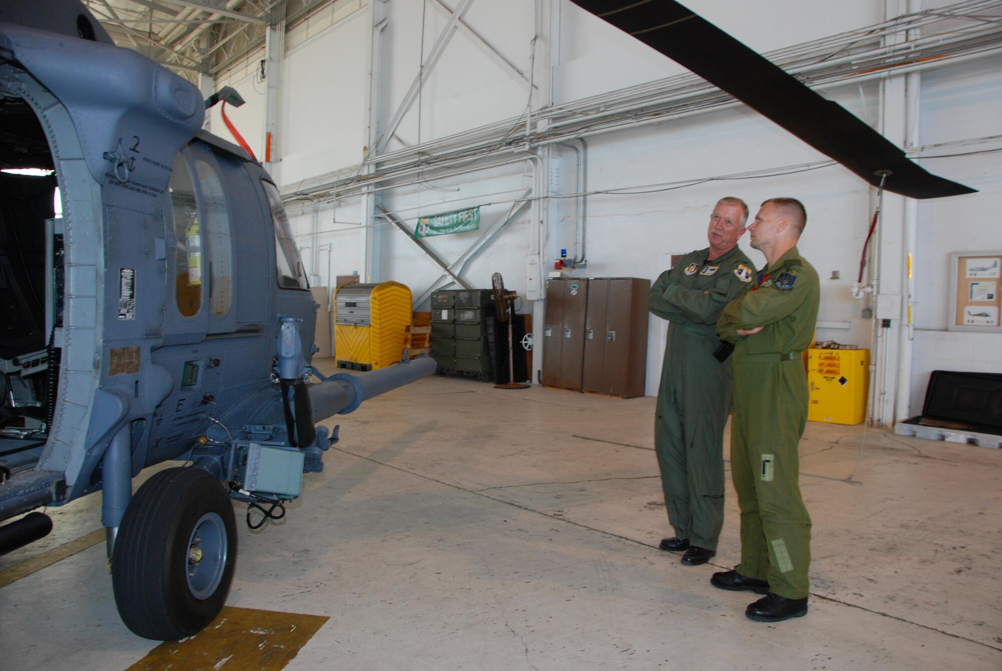 Col. Robert Dunn, 920th Rescue Wing commander, discuss the capabilities of the HH-60G Pave Hawk helicopter during a tour of search and rescue assets at Patrick AFB, Fla., April 28. (U.S. Air Force photo by: Capt. Jared Scott)