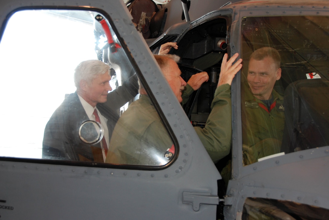 Kent Clark, Defense Appropriations Director and National Security Advisor for Congressman C.W. Bill Young, join Col. Robert Dunn, 920th Rescue Wing commander, Patrick AFB, Fla., as he shows Brig. Gen. Christopher Coates, Continental  U.S. NORAD Region deputy commander, the inside of a HH-60G Pave Hawk helicopter April 28. (U.S. Air Force photo by: Capt. Jared Scott)