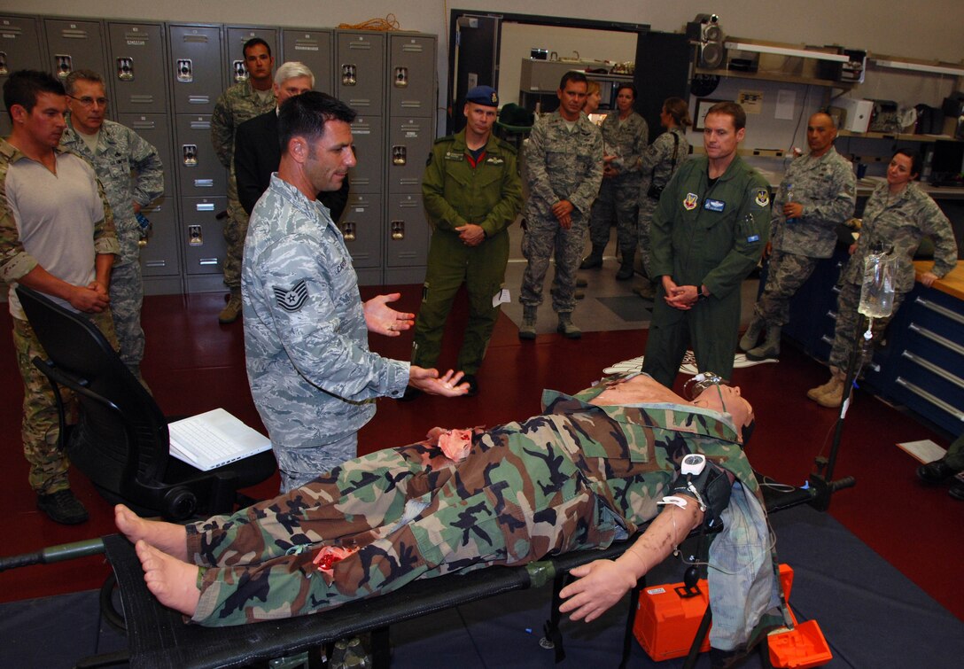 Technical Sgt. Robert Carcieri, 920th Rescue Wing aerospace medical technician, briefs Brig. Gen. Christopher Coates, Continental  U.S. NORAD Region deputy commander, Brig. Gen. Robert Branyon, 1st Air Force vice commander, about medical procedures training at Patrick AFB, Fla., April 28. (U.S. Air Force photo by: Capt. Jared Scott)