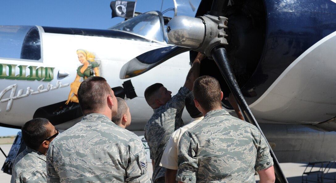 Sheppard Airmen in training view the A-26C aircraft named "Million Airess" April 27. The aircraft is only one of five of its kind still in flying condition, and that type of aircraft has a very special connection to Sheppard. Thousands of Airmen were trained at Sheppard as engine mechanics for the A-26 in the 50s. The plane is owned by the Million Air Aviation company and flown all across the country. (U.S. Air Force photo Adawn Kelsey)