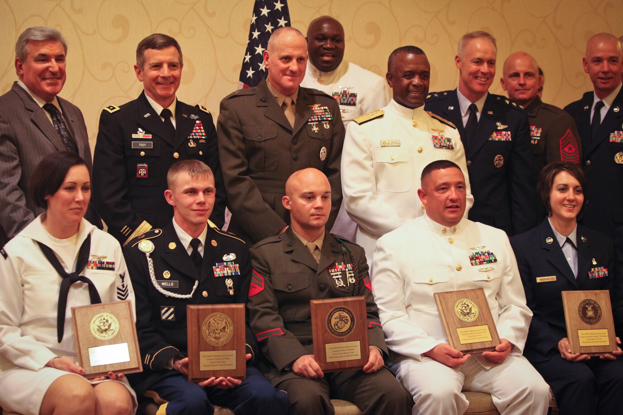 Tech. Sgt. Jeannie Washington (far bottom right), 15th Medical Group Mental Health Flight chief took home the GEICO Military Service Award for the Air Force in the drug and alcohol abuse prevention category April 18. Each service, as well as the Guard and reserves, had a winning spot in areas from traffic safety and accident prevention, to drug and alcohol abuse prevention. (U.S. Marine Corps photo/Lance Cpl. Christofer P. Baines)