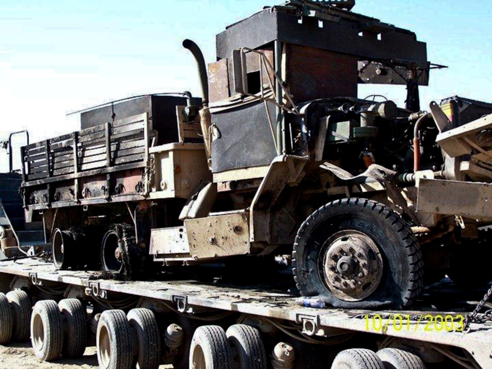 This was what was left after an improvised explosive device hit the vehicle Staff Sgt. Jacob Sutton, 96th Logistics Readiness Squadron, was travelling in during a convoy operation in 2004.  When they deploy, Eglin’s vehicle operators shift gears from bus drivers and dispatchers to “combat truckers” hauling critical cargo in convoys to and from Iraq.  (Courtesy photo)