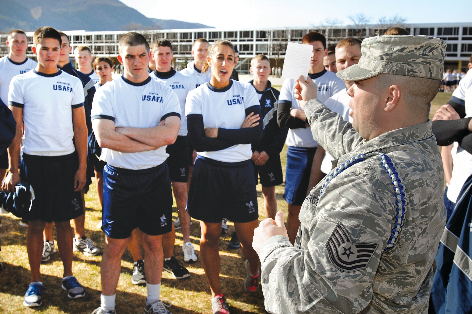 Tech. Sgt John Craven, NCOIC of Basic Cadet Training, participates in a cadet training exercise.  Academy Military Training NCOs play a key role in the training and development of cadets. (U.S. Air Force photo by Mike Kaplan)