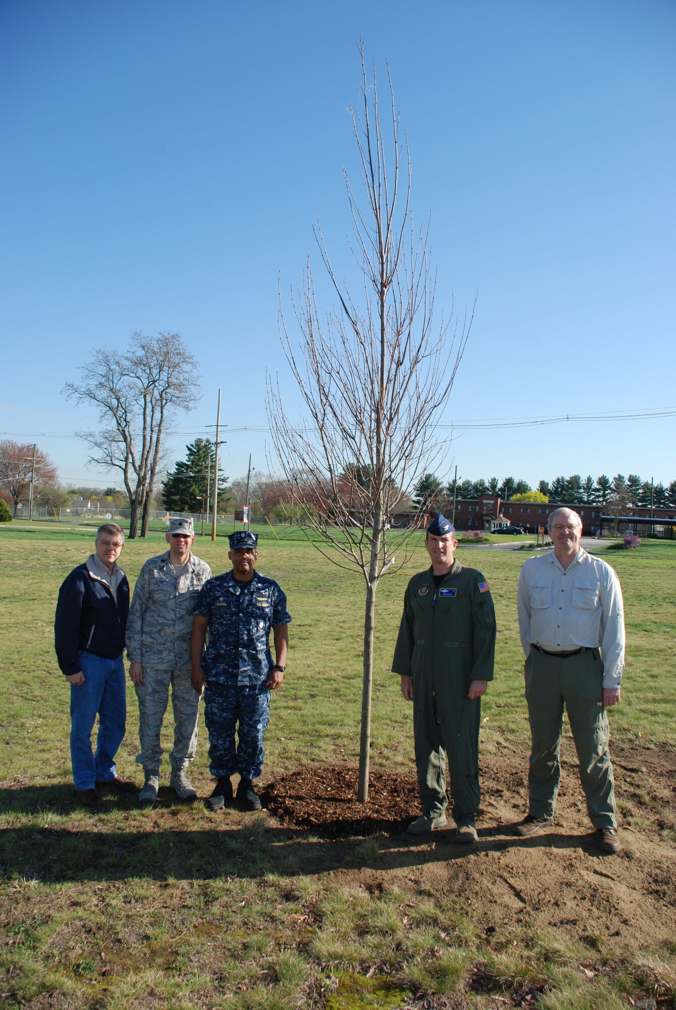As a part of Arbor Day a tree was planted here April 29 in front of the Military Entrance Processing Station Building. The tree is a part of a continuing stewardship for Westover to be recognized as a Tree City USA by the National Arbor Day Foundation. ?The Air Force and Westover ARB have always worked to be responsible stewards of the federal land entrusted to our care,? said Colonel John Healy, vice commander of the 439th Airlift Wing. ?Arbor Day is an excellent way to let the people of Westover and the local community know how much we value the environment in which we live.? (US Air Force photo/Senior Airman Alexander Brown)