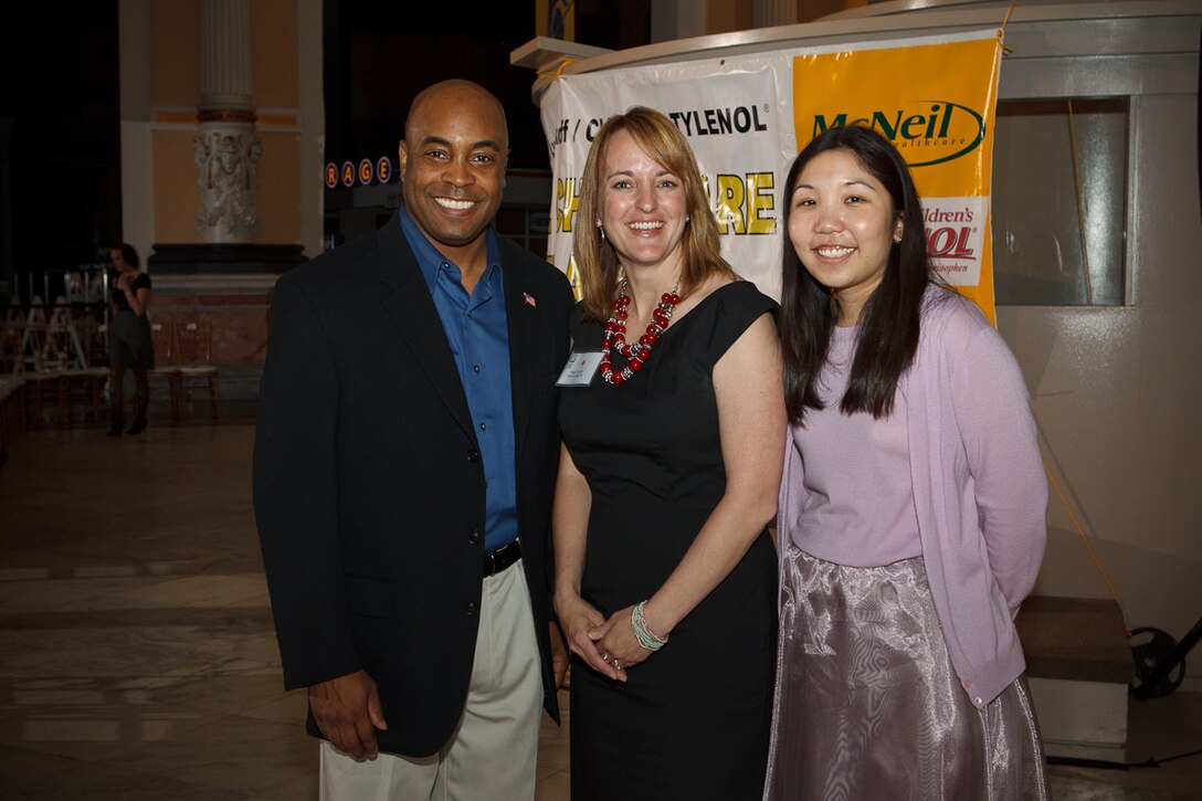 (Left to right) Col. Trent Edwards, 28th Mission Support Group commander, stands with Angie Vinson, Ellsworth Air Force Base, S.D., family child care provider, and Lisa Tahara, an employee from Yokota AB, Japan's Child Development Center, at the 2011 National Child Care Teacher awards ceremony in Philadelphia, April 14, 2011.  Mrs. Vinson received an award in recognition of  the quality child care she provides.  (Courtesy photo by Paul Csihas, used with permission from The Terri Lynne Lokoff Child Care Foundation.) 