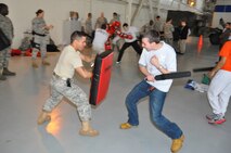 Westover hosted approximately 170 students from local high schools, including 15 Springfield middle school students, as part of the fourth annual Hispanic Youth Leadership Symposium (HYLS) held on the base April 27. The students participated in events including performing military first aid, marching in formation, touring a C-5 jet, and launching model rockets. The goal of HYLS is to reach out to Hispanic youth who have the potential to make a difference and become future leaders. (US Air Force photo/Senior Airmen Alexander Brown)