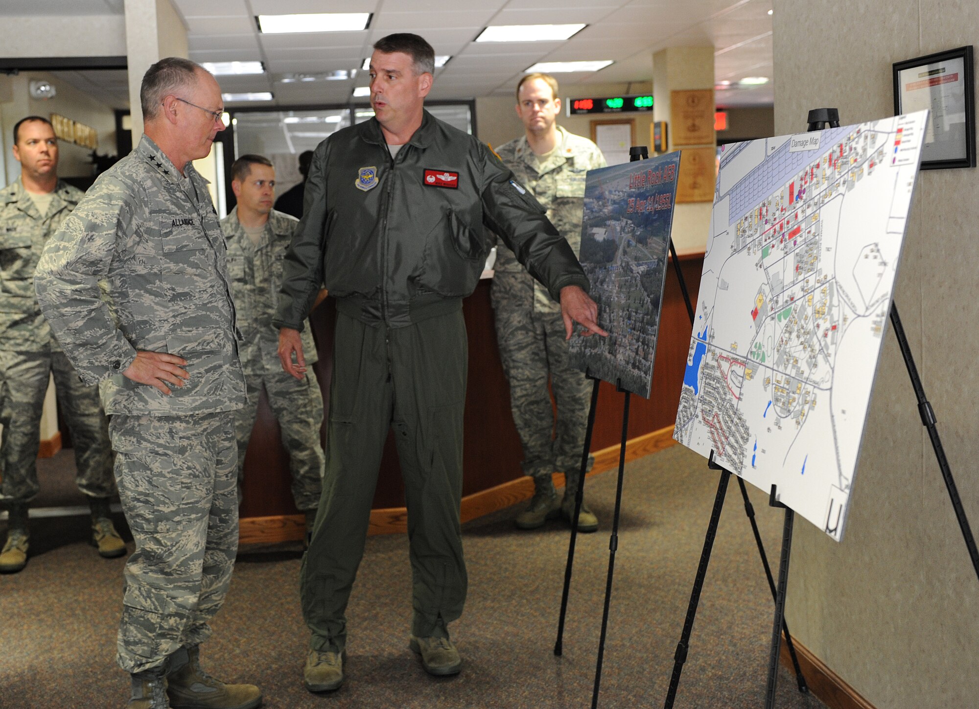 Col. Mike Minihan, 19th Airlift Wing commander, points out tornado damage at Little Rock Air Force Base, Ark., to Lt. Gen. Robert Allardice, 18th Air Force commander, on April 28, 2011. A tornado struck the base at approximately 8 p.m. April 25, damaging aircraft, multiple work centers and approximately 100 base housing units. (U.S. Air Force photo by Airman 1st Class Ellora Stewart)