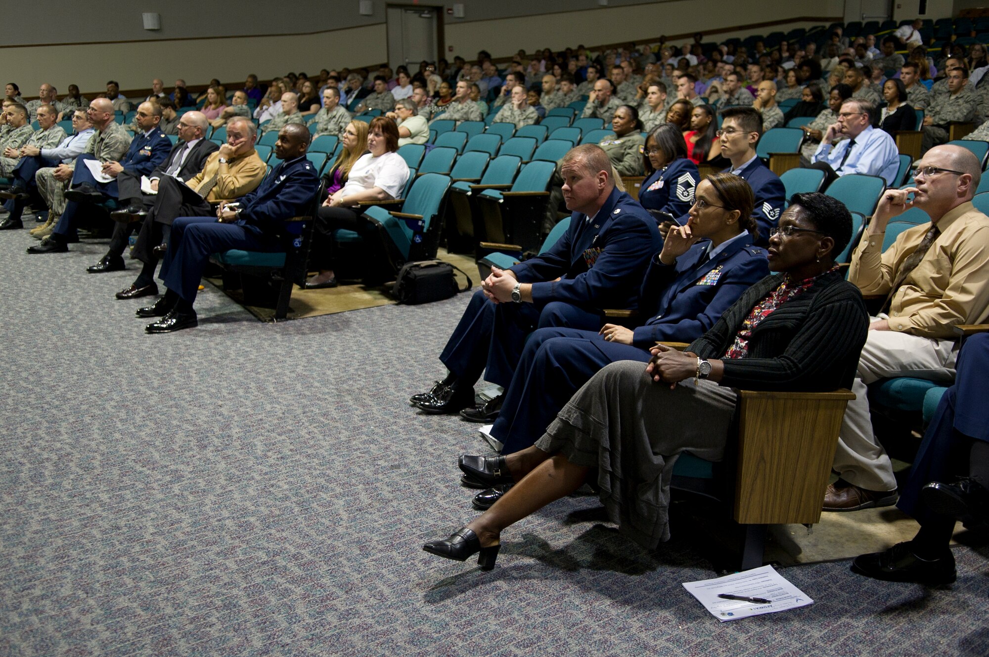After spending the morning hours learning about the new Capitol Wingman Culture initiative started by Air Force District of Washington Commander, Maj. Gen. Darren McDew, the members of AFDW listen to the results of their most recent cross-functional inspection, April 28, Joint Base Andrews-Naval Air Facility Washington, Md. General McDew and his entire AFDW team including the 11th Wing, the 79th Medical Wing and the 844th Communications Group, will undergo a compliance inspection this summer.
(U.S. Air Force photo by Master Sgt. Tracy L. DeMarco)