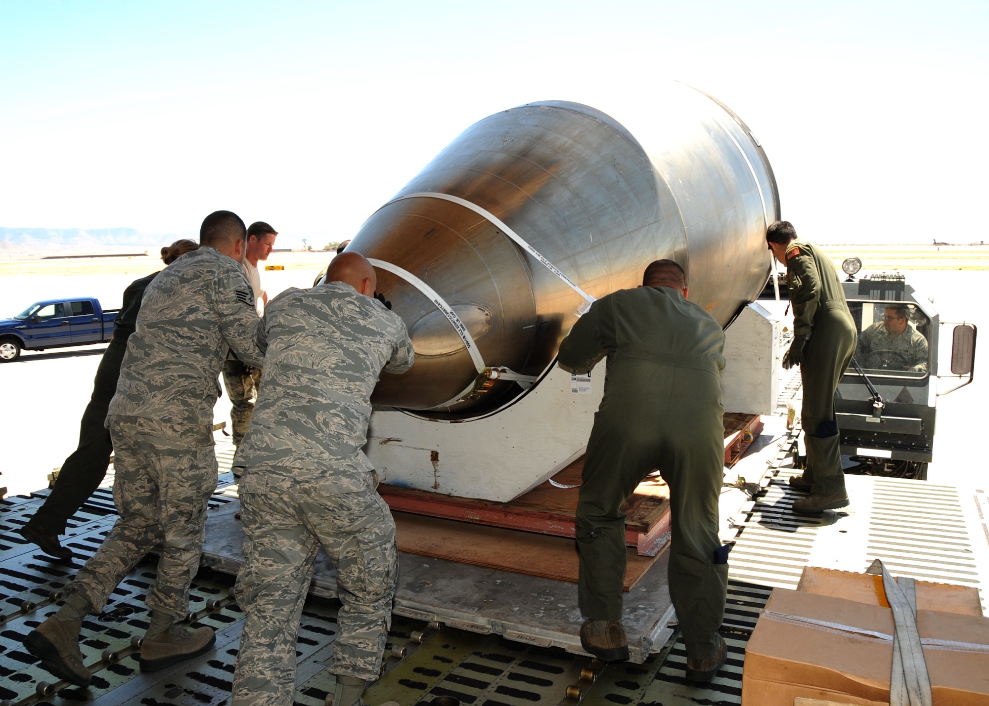 Airmen offload the nose of the LGM-118A Peacekeeper April 22.  U.S. Air Force Photo by Dennis Carlson
