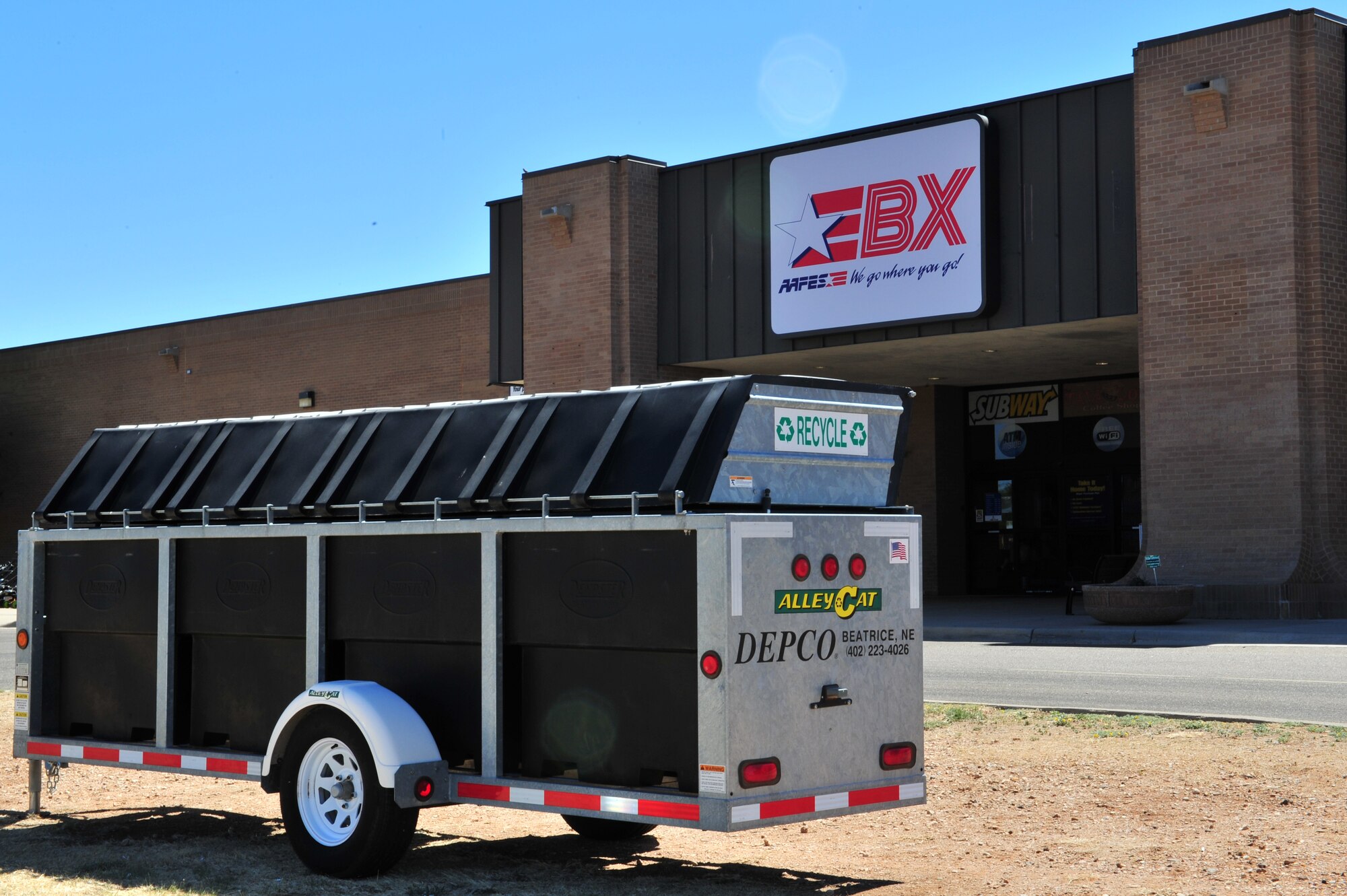 A mobile recyclable collection trailer is positioned in front of the Cannon Air Force Base, N.M. Base Exchange in support of Earth Day and Arbor Day, April 28, 2011. (U.S. Air Force photo by Tech. Sgt. Josef Cole)(RELEASED)