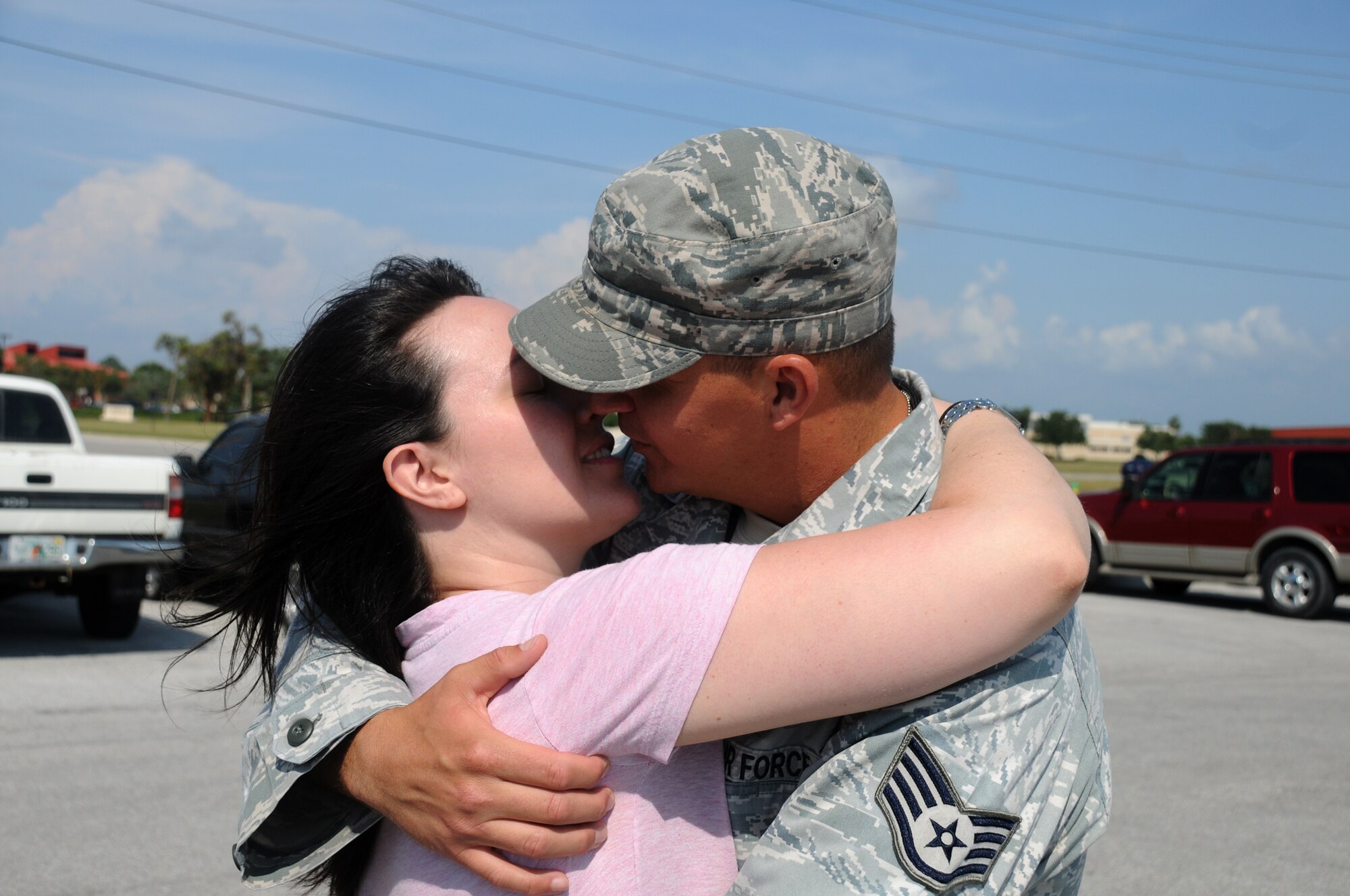 MacDill Air Force Base, Fla. --  Staff Sgt. Robert Quinn and his wife Erin said their goodbyes here April 28 before Robert, an avionics technician with the 927th Air Refueling Wing, deployed to the East Asia Theater of Operations.  Robert is a reservist with the unit and had to put his two businesses on hold while he serves his country. (Official U.S. Air Force photo by Staff Sgt. Shawn Rhodes)